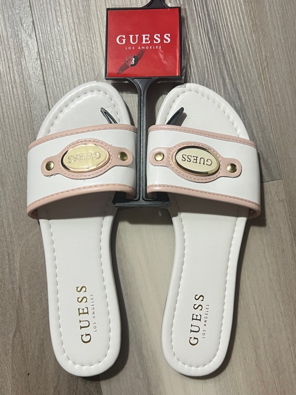 GUESS White and Light Pink Slide Sandals with Gold Emblem